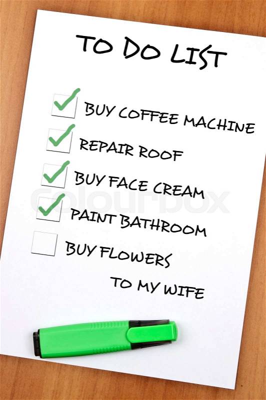To do list with Buy flowers to my wife not checked, stock photo