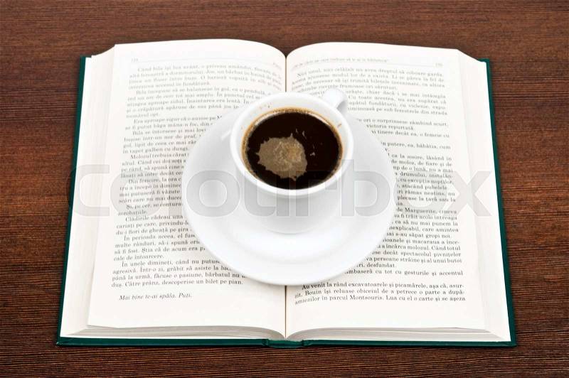 Book and coffe on desk, stock photo