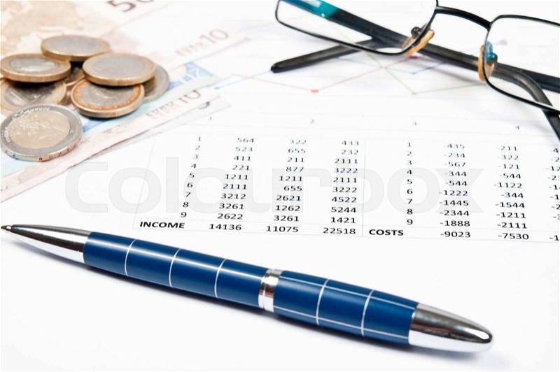 Financial paper and office tools, stock photo