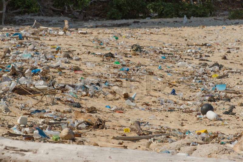 Dirty beach on the island of Little Andaman in the Indian Ocean littered with plastic. Pollution of coastal ecosystems, natural plastic and beaches, stock photo
