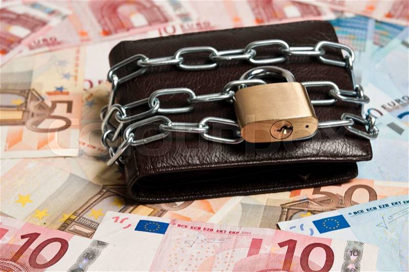 Leather wallet locked with chain, stock photo