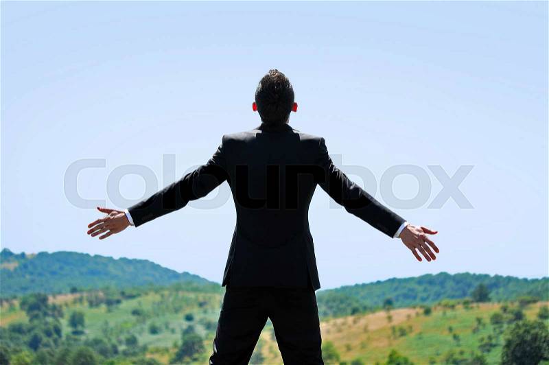 Business man freedom in nature , stock photo
