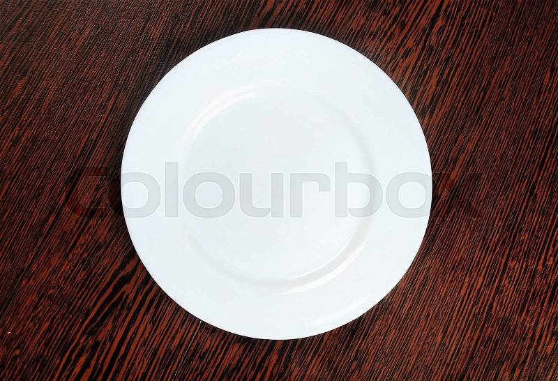 Empty plate on table , stock photo