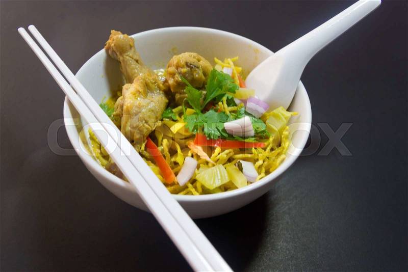 Khao Sawy Northern Thai Noodle Curry Soup with chicken, stock photo