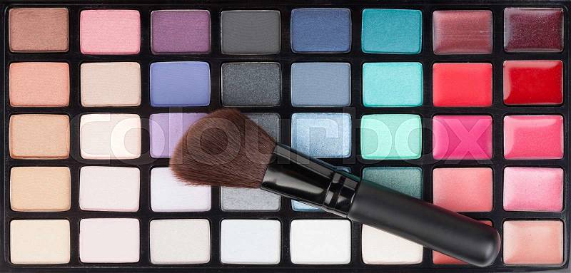 Professional makeup colorful palette and brush, stock photo
