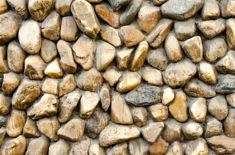 Stone wall. Texture of different forms stones similar to wall, stock photo