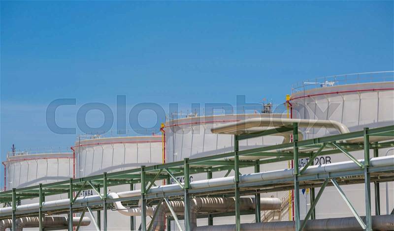 Tank container with blue sky in refinery industrial plant , Eastern of Thailand , stock photo
