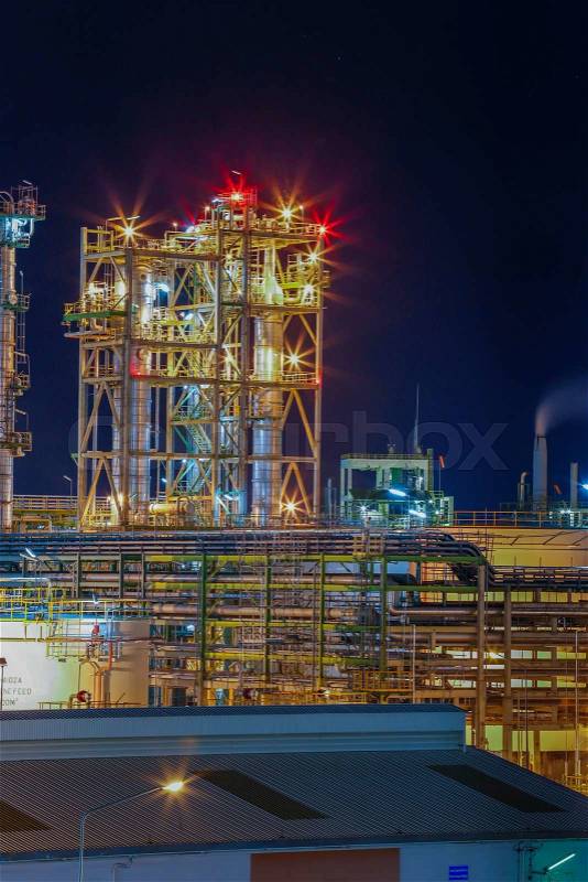 Night scene of Petroleum plant with beautiful lighting on structure, stock photo