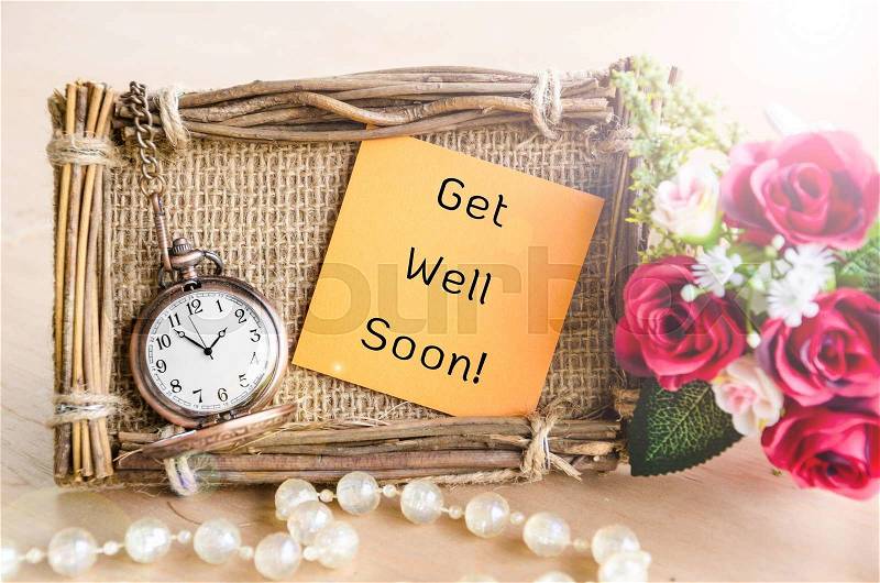 Hand-made Get Well Soon greeting card with roses and pocket watch, stock photo
