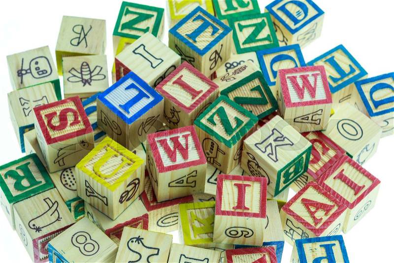 Stack of colorful alphabet blocks isolated on white background, stock photo
