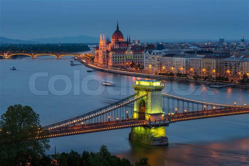 Budapest Chain Bridge, green glow on the Chain bridge in Budapest, as the night lights are warming up, stock photo