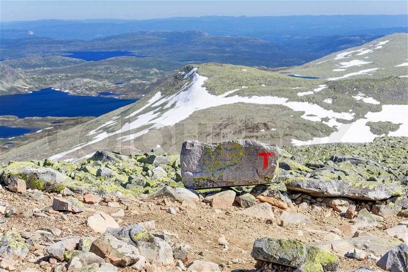 Signs of the Norwegian Trekking Association (Den norske turistforening, DNT) on the path to Gaustatoppen mountain (Norway), stock photo