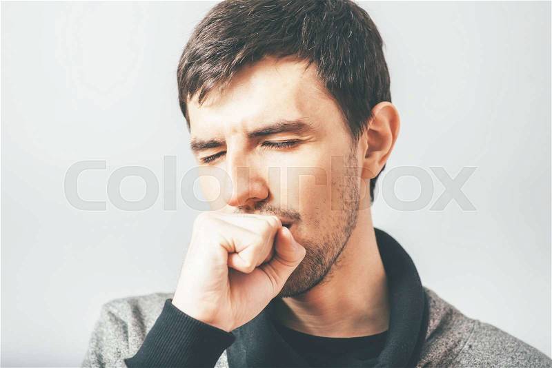 Man coughs, stock photo
