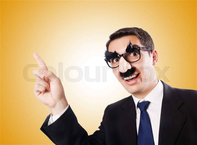 Funny businessman with eyebrows and moustache, stock photo