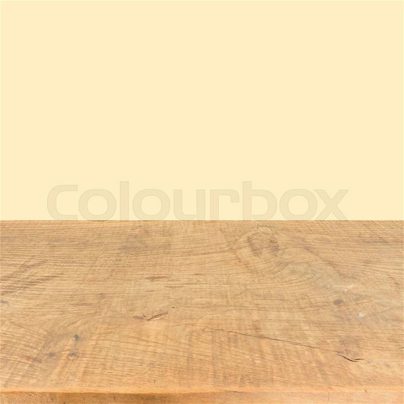 Brown wood plank texture background with yellow wall for product show use, stock photo