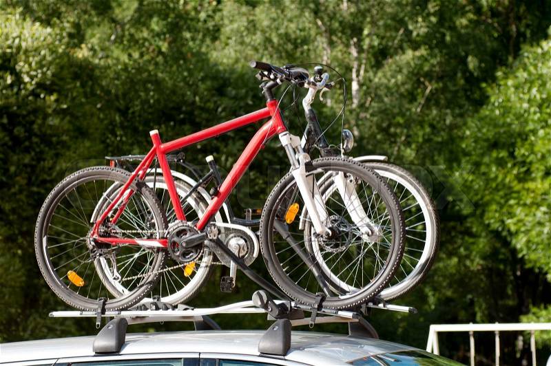 Transportation of bicycles on the roof of the car, stock photo