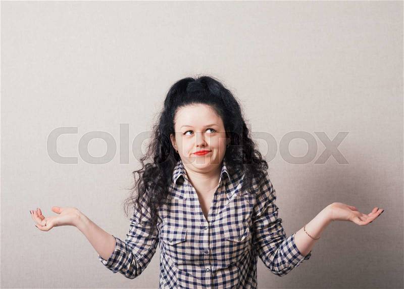 A girl do not know what to do, stock photo