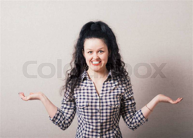 A girl do not know what to do, stock photo