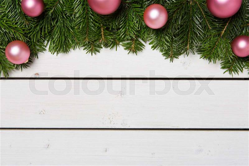 Christmas decoration with green tree on white wooden planks - gift, card, stock photo