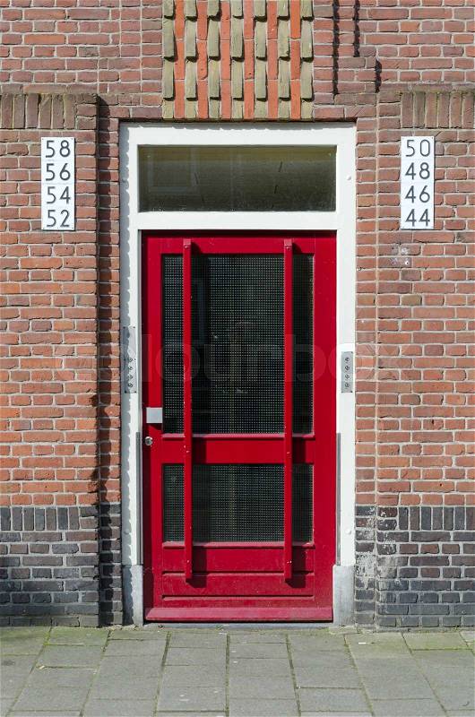 Door outside apartment building in Amsterdam, Netherlands, stock photo