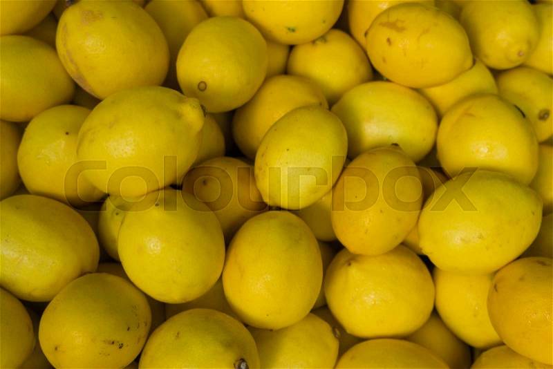 Fresh yellow lemons. lemons background, stock photo
