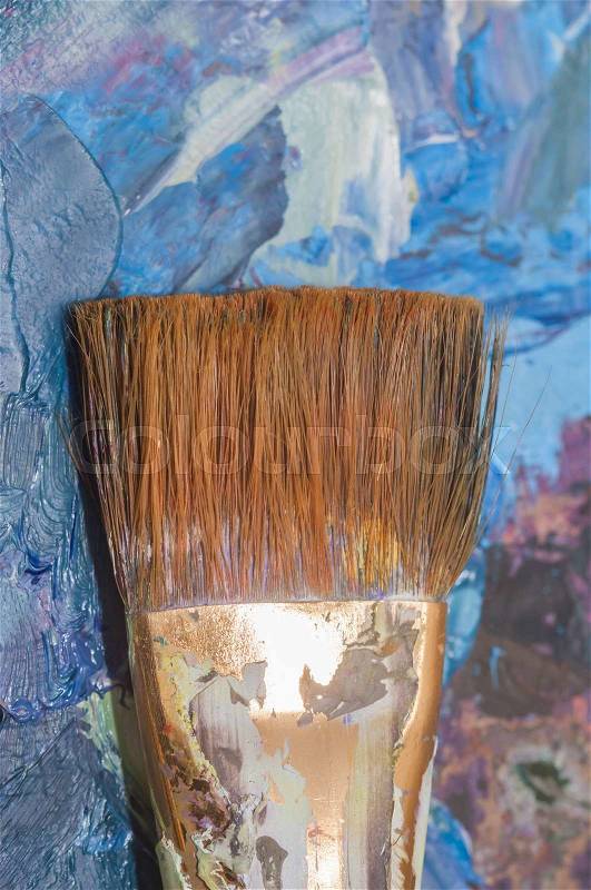 Oil paints and brushes can be used as background, stock photo