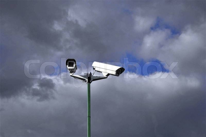 Security cameras mounting on the high top position, stock photo