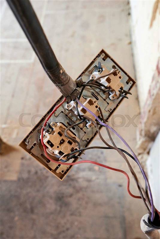 Light switch and electrical outlet to be reinstalled, stock photo