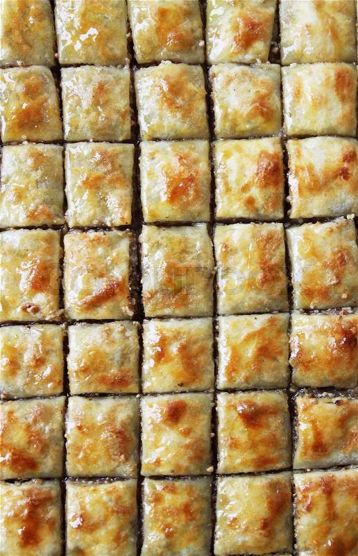 Eastern sweets, baklava stuffed with nuts and honey, stock photo
