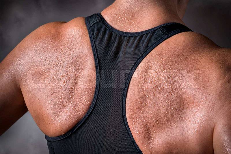Picture of a trained back of a middle aged woman over 45 years, stock photo