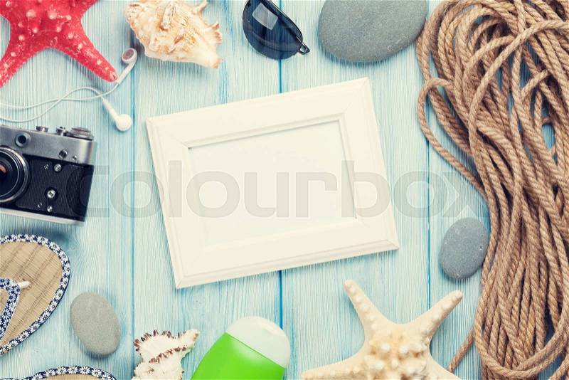 Travel and vacation photo frame and items. Top view. Toned, stock photo