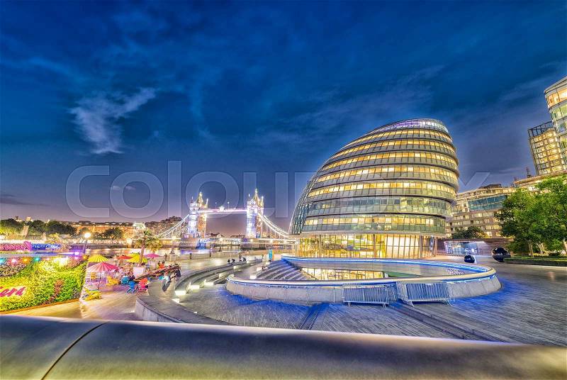 LONDON - JUN 12: Contemporary London office buildings along London Riverside on June 12, 2015 in London, UK. The offices benefit of high quality office space located next to Tower Bridge, stock photo
