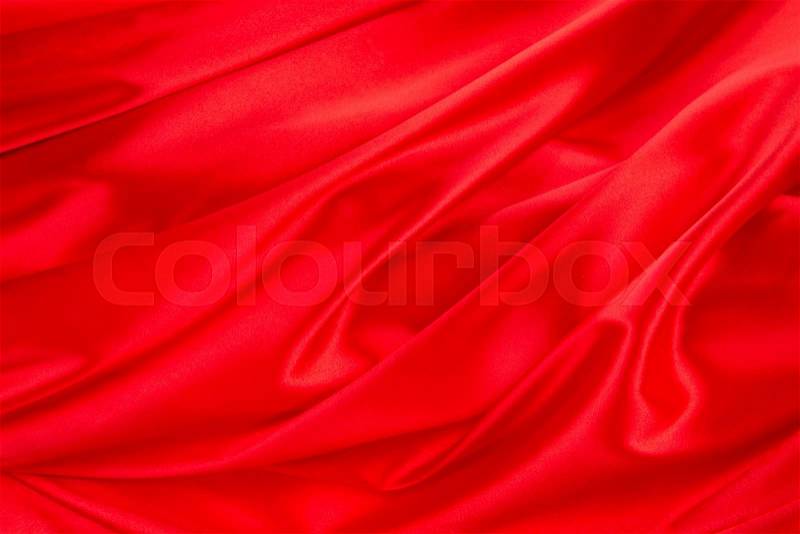 Red silk drapery. Close up on the whole background, stock photo