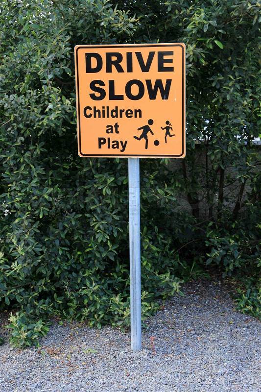 Caution road sign, drive slow, maybe children at play in the residential area, stock photo