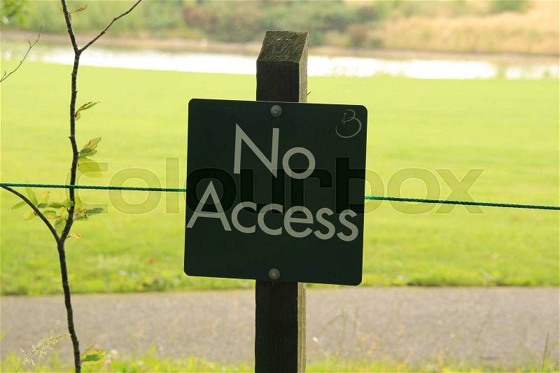Warning sign in the park in the summer, no access, stock photo