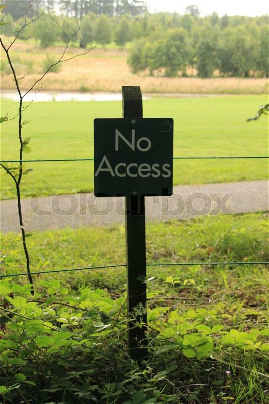 Warning sign in the park in the summer, no access, stock photo