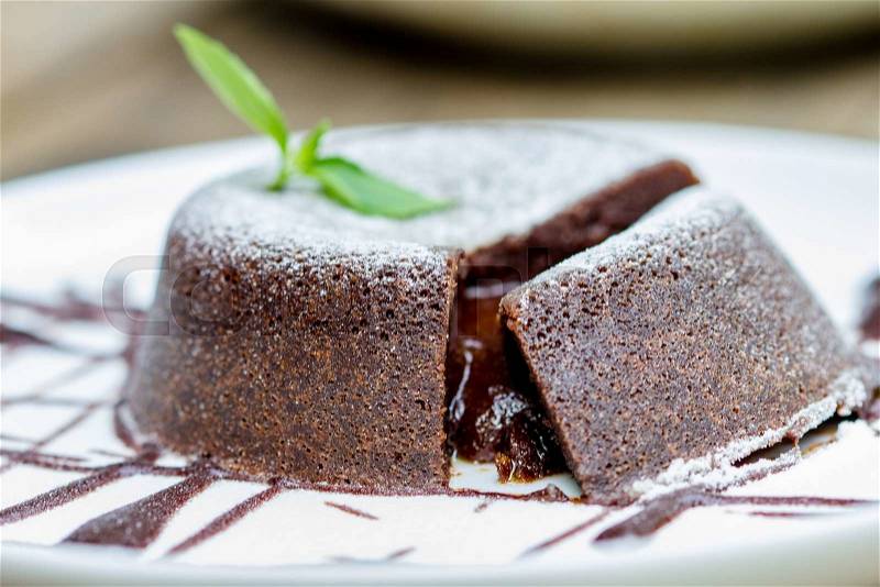 Dark chocolate lava cake in plate, stock photo