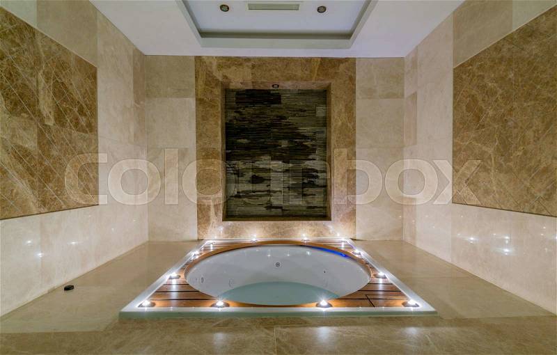 Spa room with burning candles, stock photo