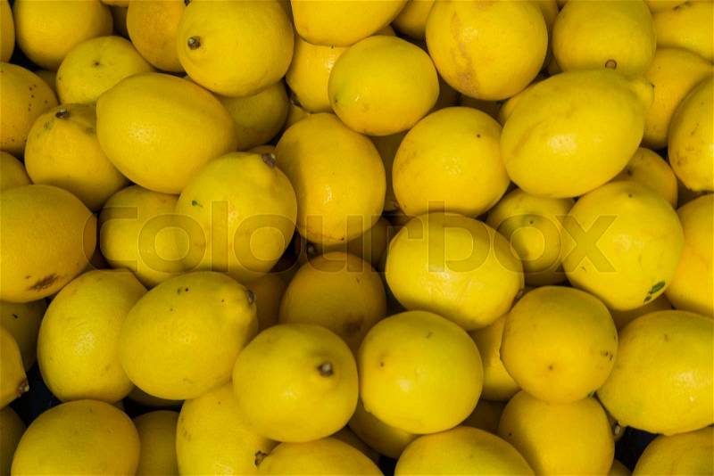 Fresh yellow lemons. lemons background, stock photo