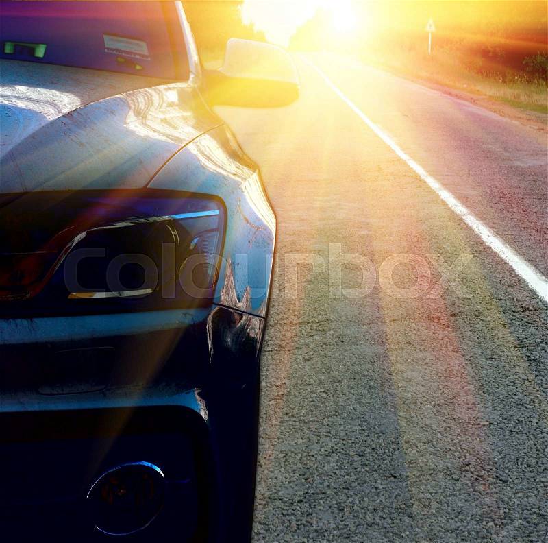 Gar on the road with morning sun, stock photo