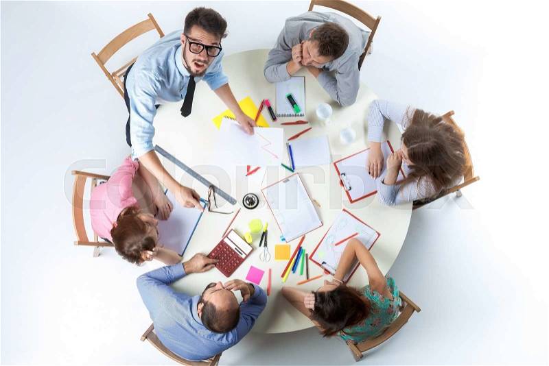 Top view of business team, sitting at a round table on white background. concept of successful teamwork, stock photo