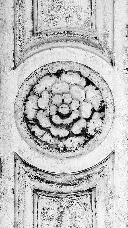 Flower ornament on column of church greyscale in Murano, Venice, Italy, stock photo