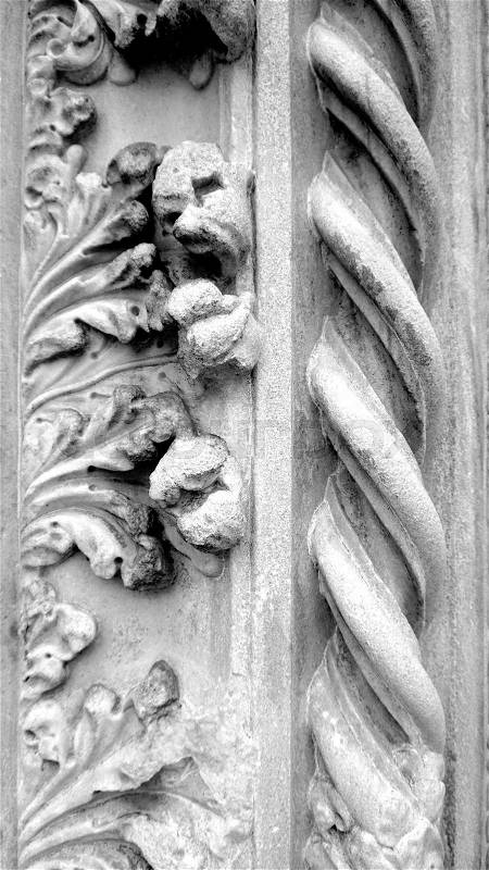 Details and ornaments close up column of church in Venice, Italy, stock photo
