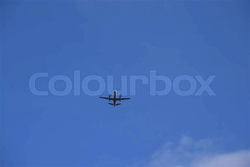 Close up of a propeller plane in the sky, stock photo