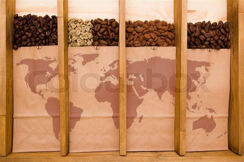 Varieties of coffee packaged by type and graphic representation of the earth, stock photo