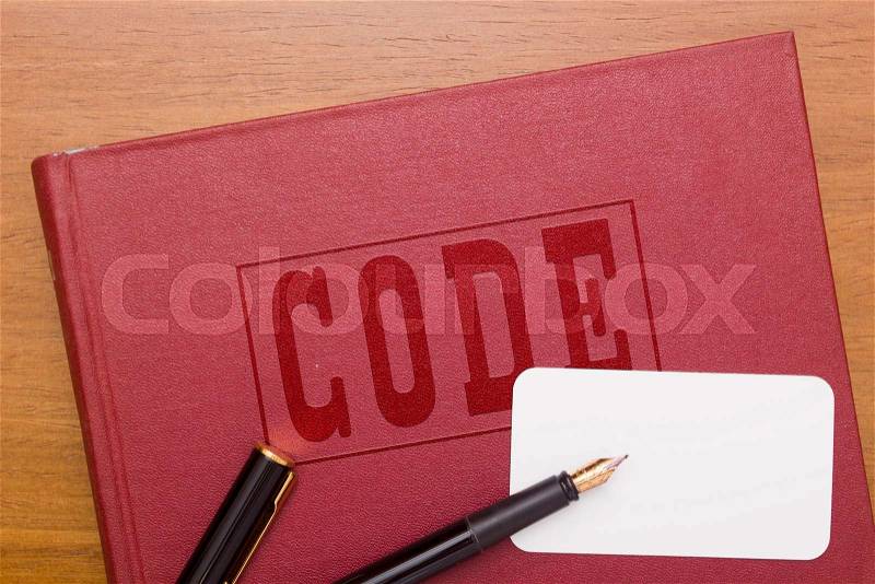 A code of laws - the book and business card for a lawyer, stock photo