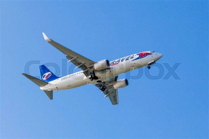 FARO,PORTUGAL-MAY 09: Trave Service Boeing B737 lands at Faro International Airport, May 09, 2015 in Faro, Portugal. Travel Service is the largest private airline company in the Czech Republic, stock photo