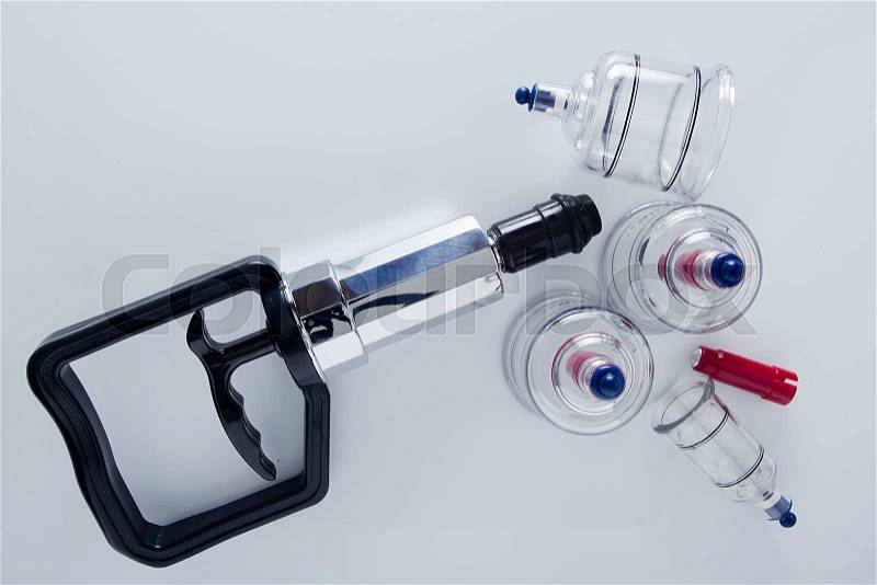Medical set of glass jars and piston vacuum massage, stock photo