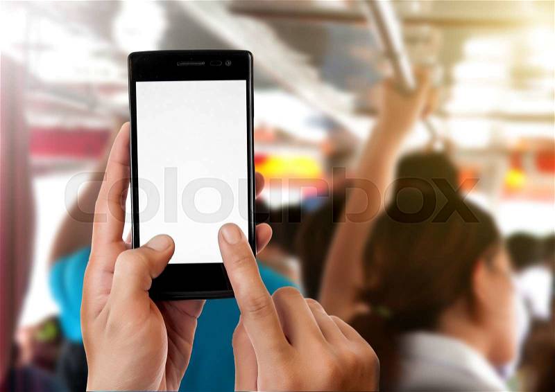 Man\'s hand holding mobile smartphone,People going by bus background, stock photo