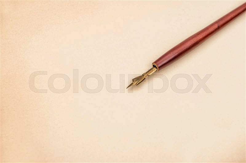 Paper for a letter with antique ink pen. Vintage style background with space for your text, stock photo